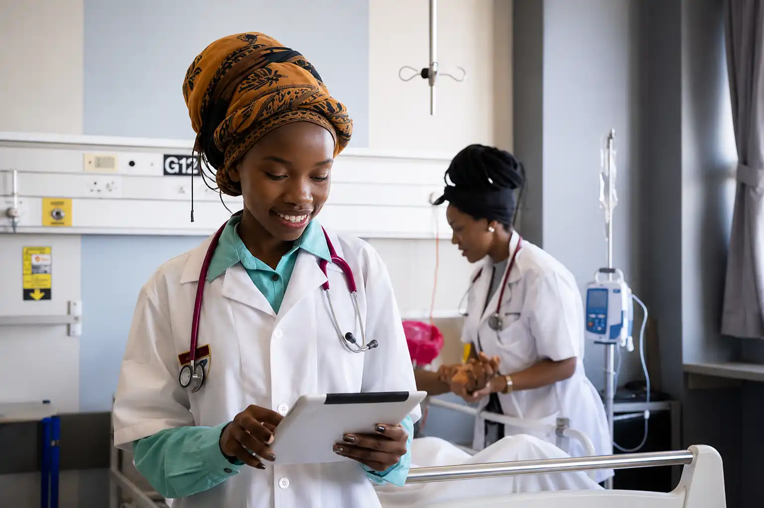 A HAAN doctor reviewing patient information on a tablet